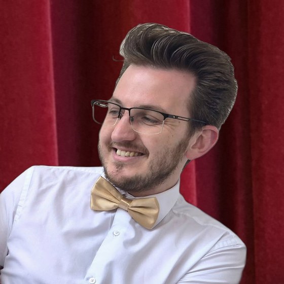 Luke Humphries as Dennis